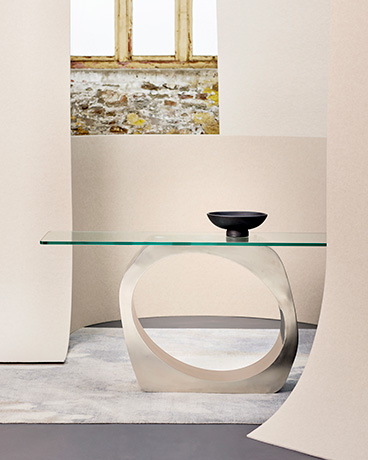 Skye console with glass propped